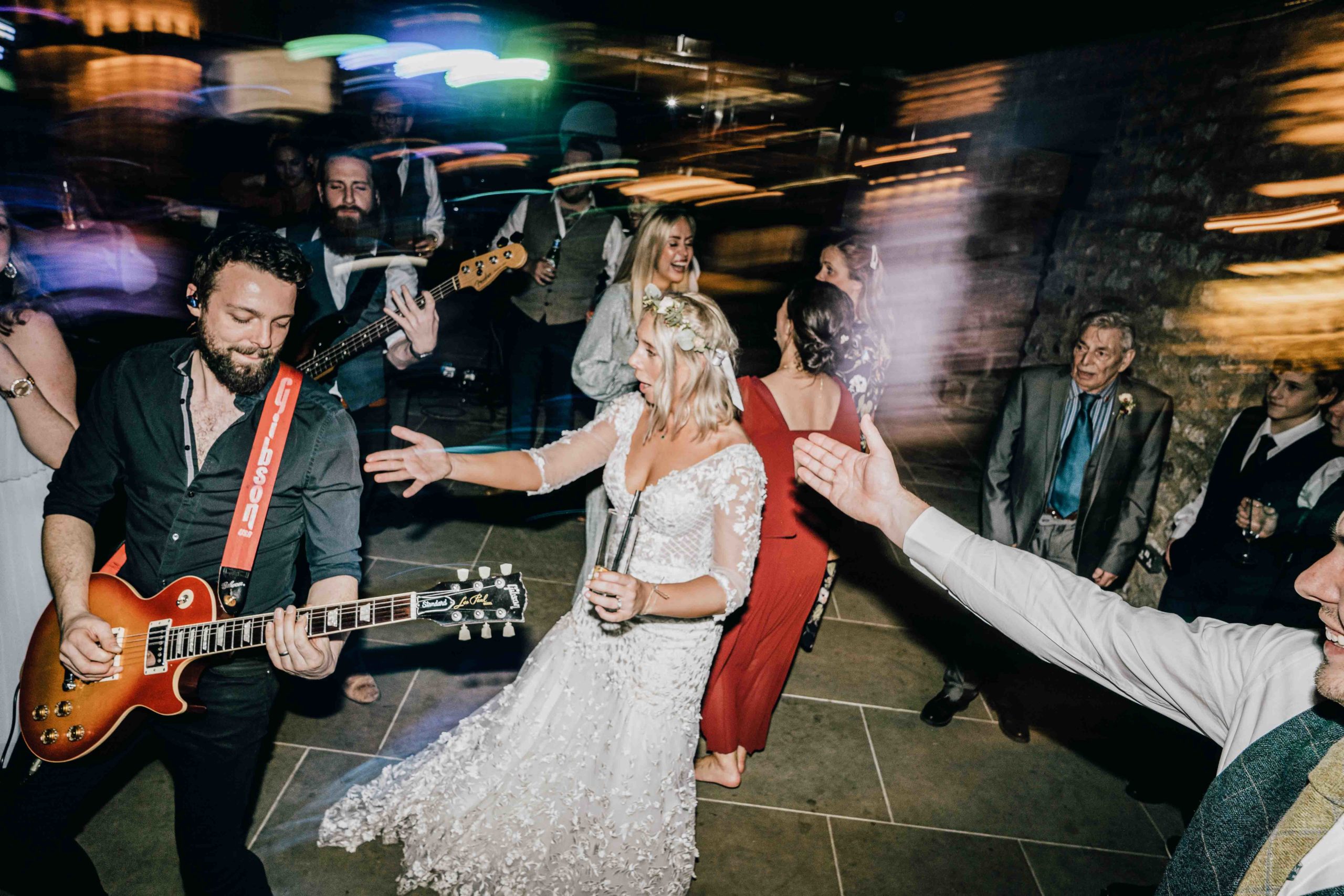 Bride dancing with the band at her wedding