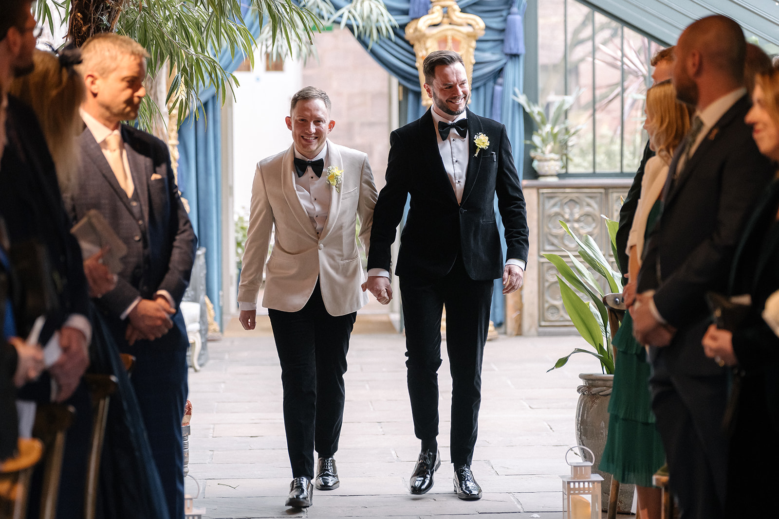 Mark and Jonathan couple walk down aisle together at their wedding