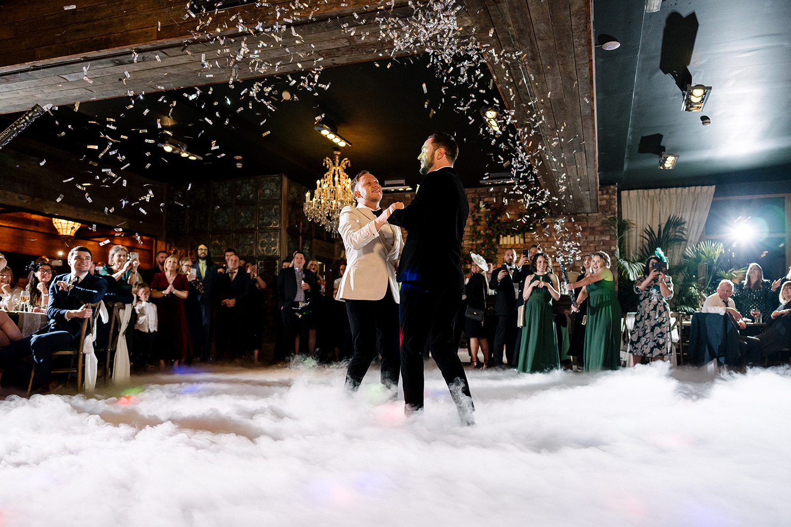 Amazing confetti photo during Mark and Jonathan's first dance
