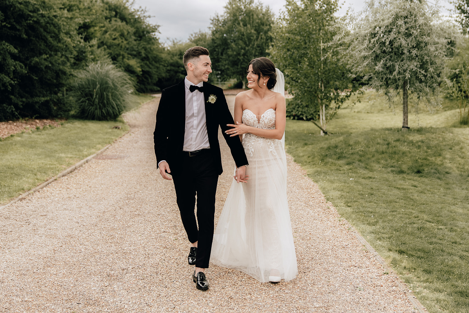 Wedding photo of couple walking