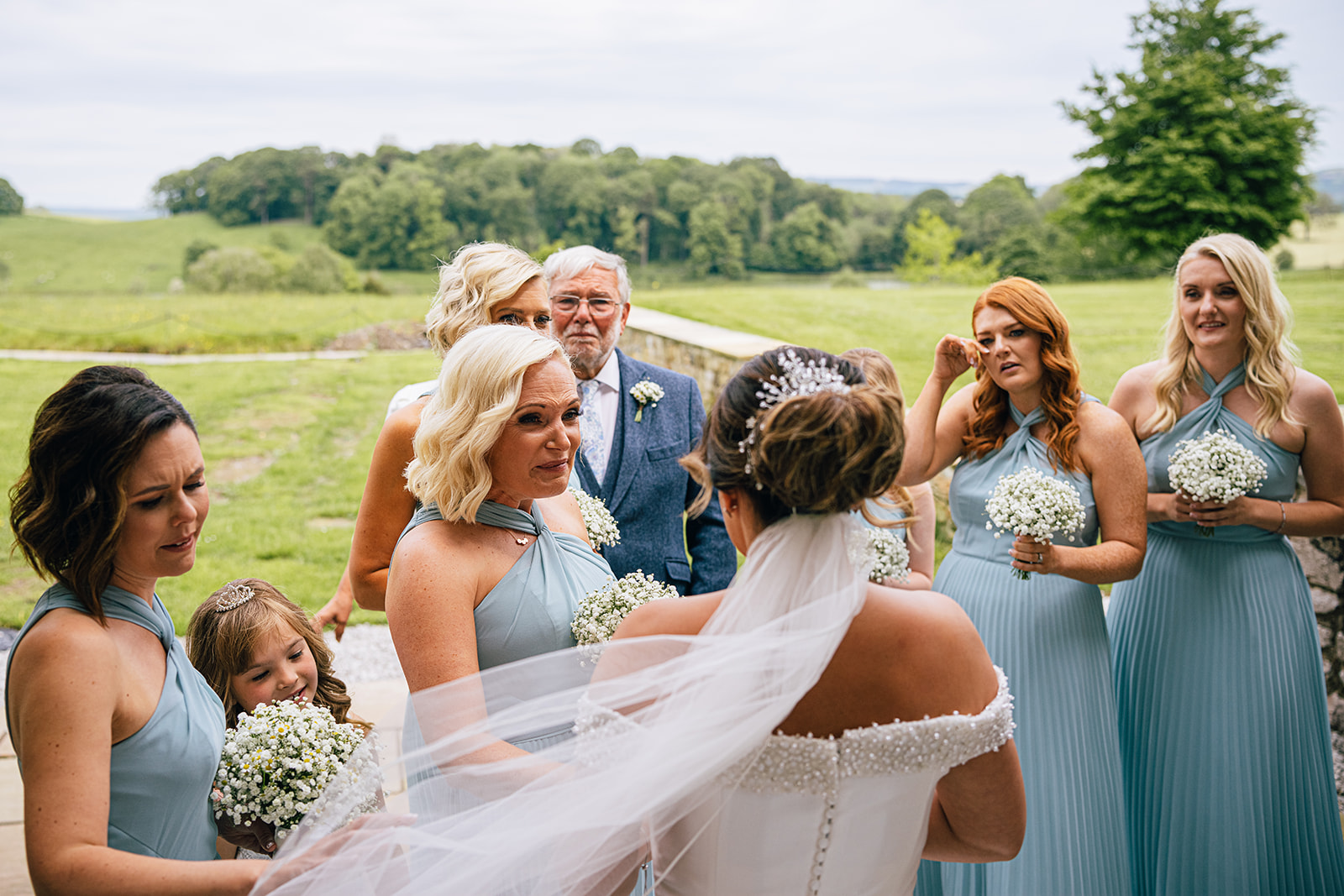 Wedding photographs of the first look at the Coniston Hotel