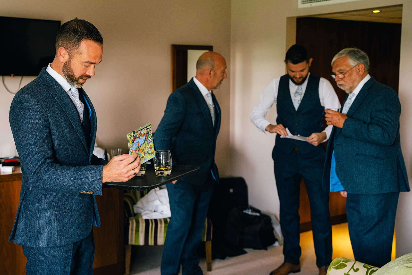 Wedding photographs of Groom prep at the Coniston Hotel