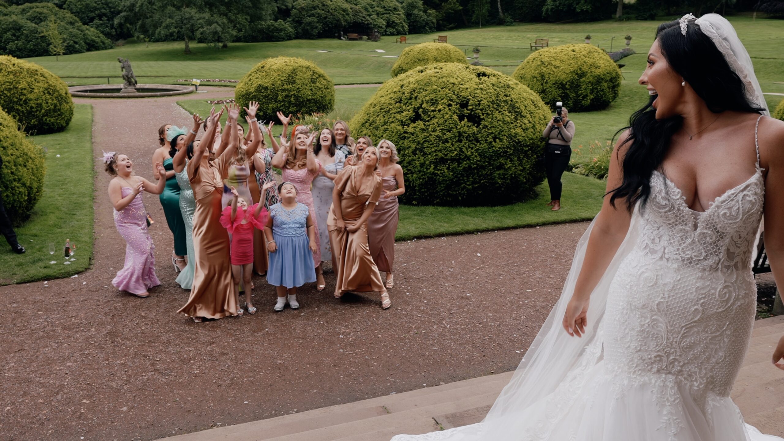 Wedding bouquet throw at Worley Hall